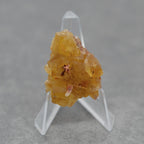 Fluorite jaune orange maclée 22g sur présentoir