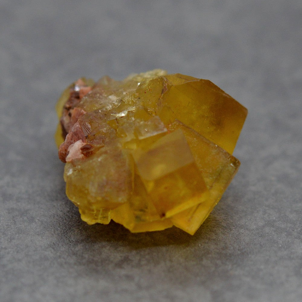 Pierre brute fluorine jaune orangée de 25g marocaine